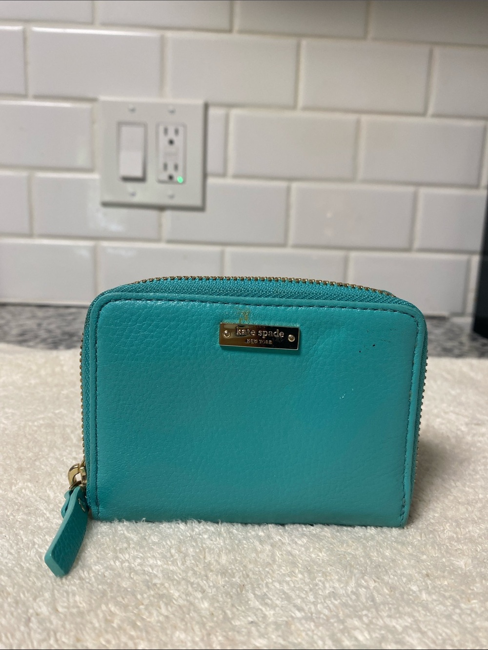 kate spade turquoise zip-around wallet with gold plaque